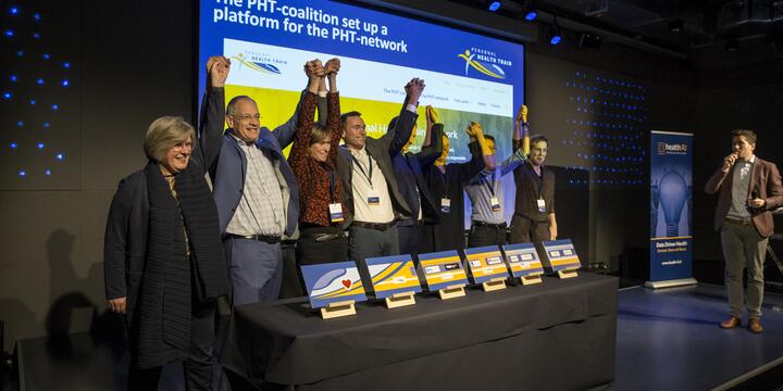 People celebrating on stage