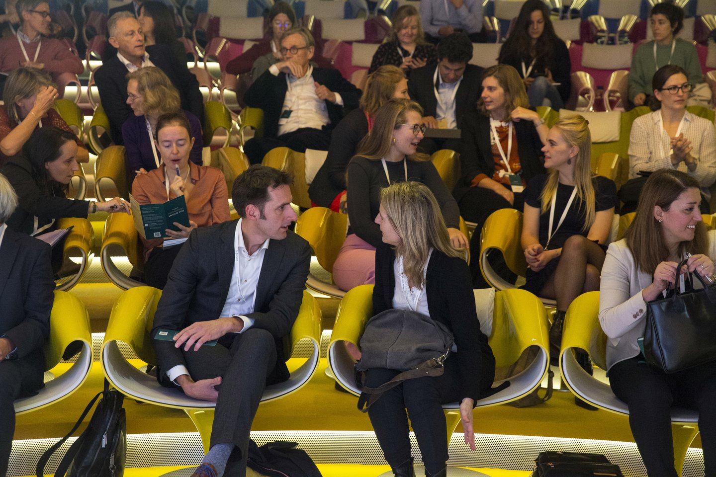 Audience sitting on chairs