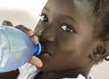 Boy drinking water